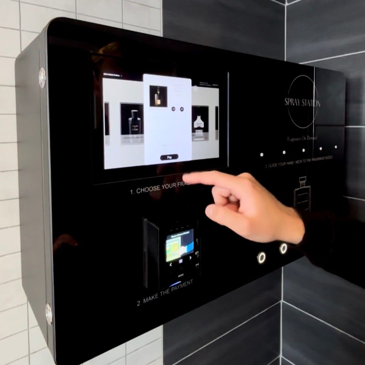 Guest choosing a fragrance on a Spray Box touchscreen