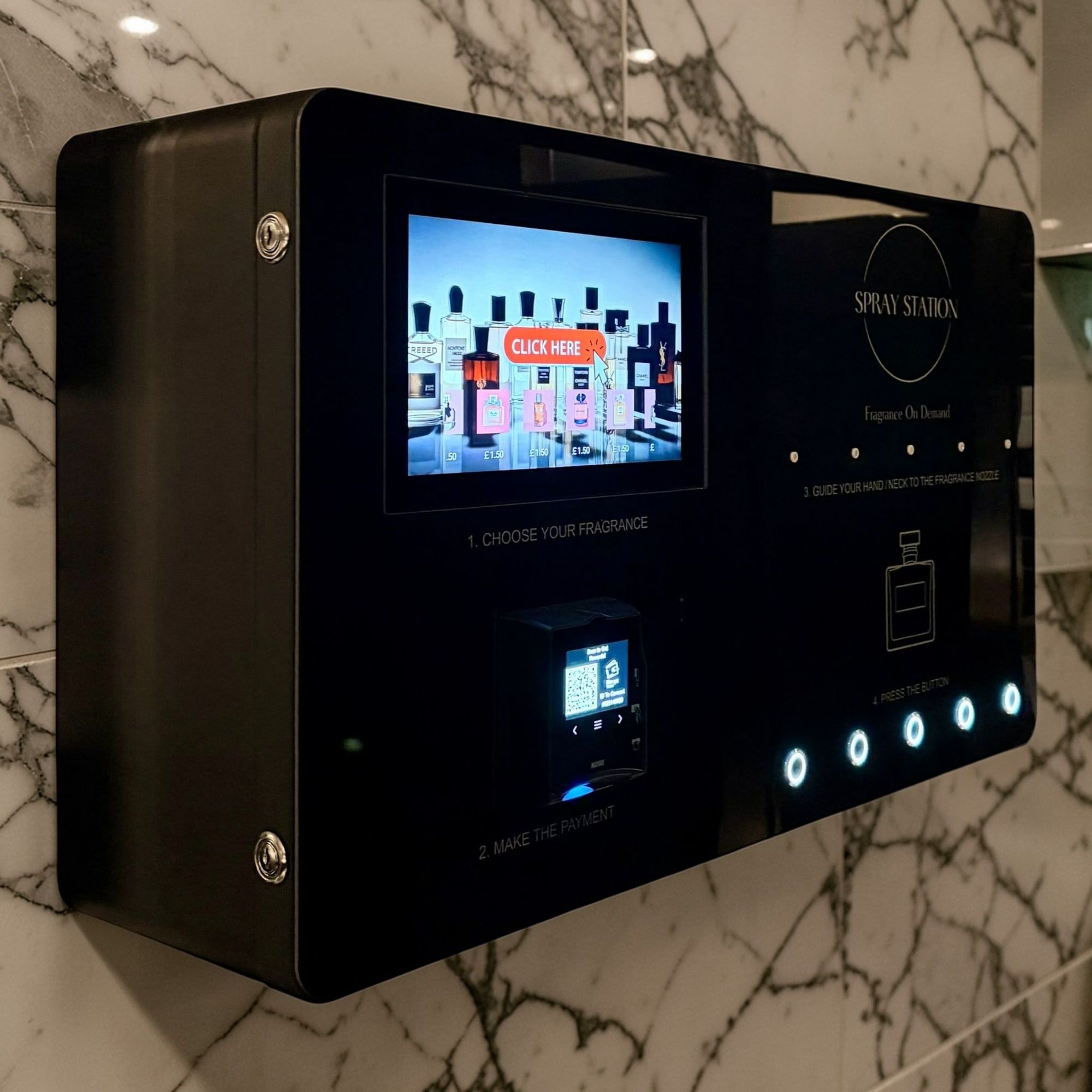 Spray Box mounted on a marble wall in a hospitality venue