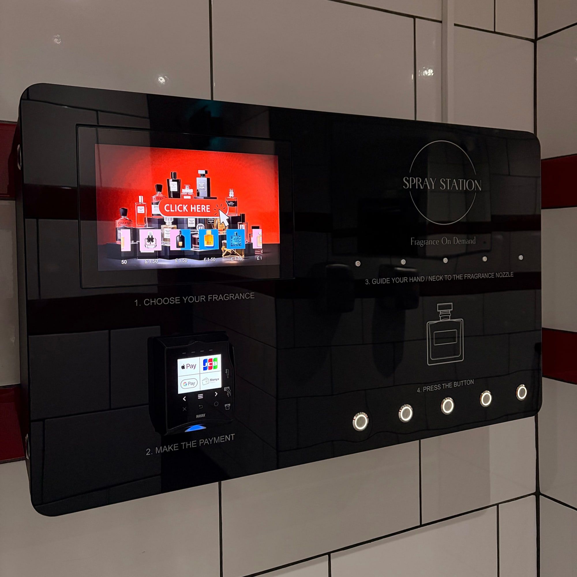 Spray Box on a red-tiled washroom wall