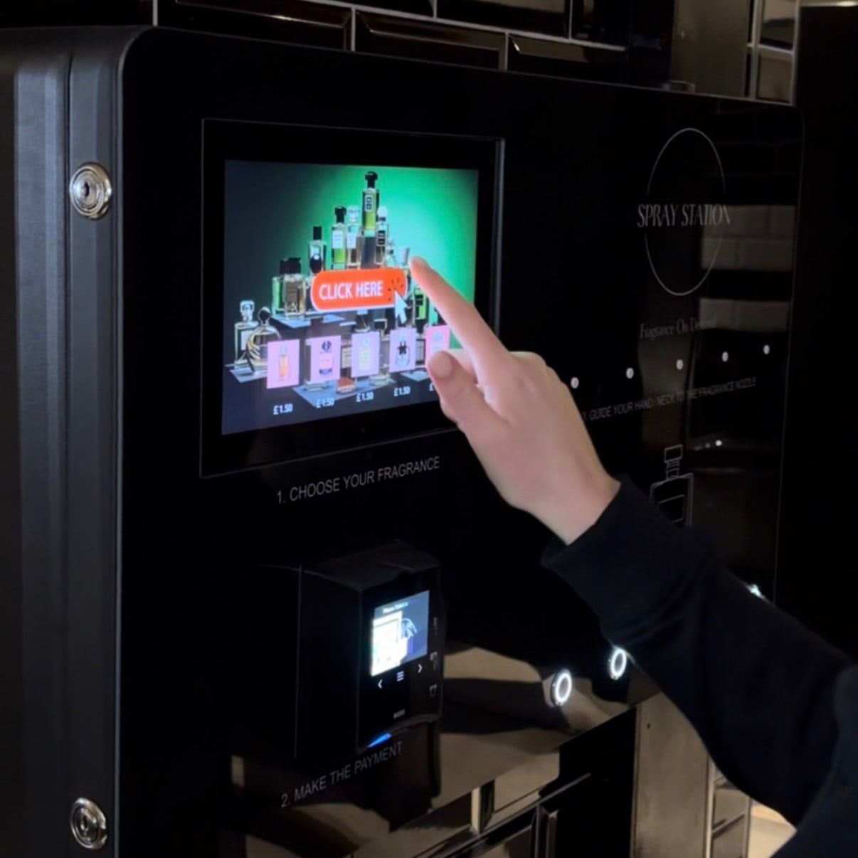 Spray Station wall-mounted perfume vending machine installed in a venue